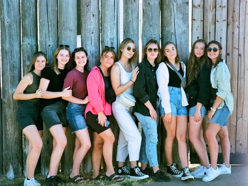 group of nine sorority women posing for a photo